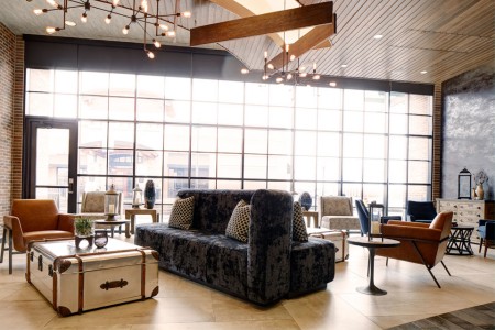 Hotel lobby with soft seating and coffee table 