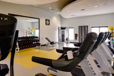 Fitness studio with treadmills and weights 