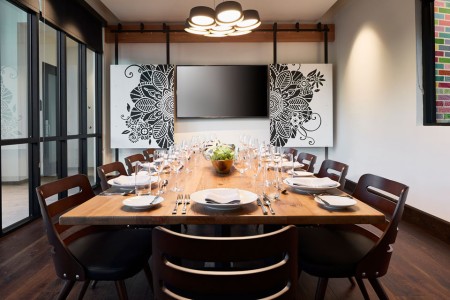 Archer Hotel Tysons — Private dining room with TV